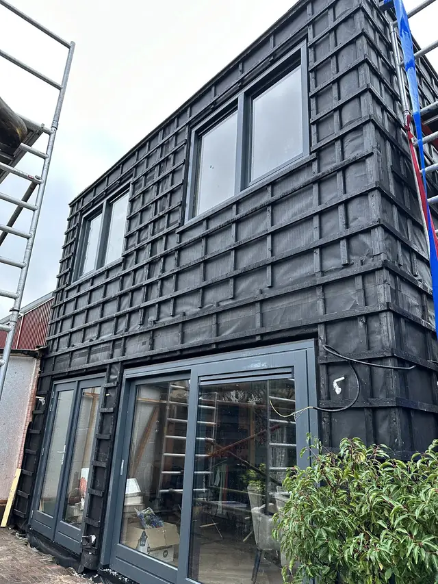 Dakopbouw met houten gevelbekleding, foto 4 van 16