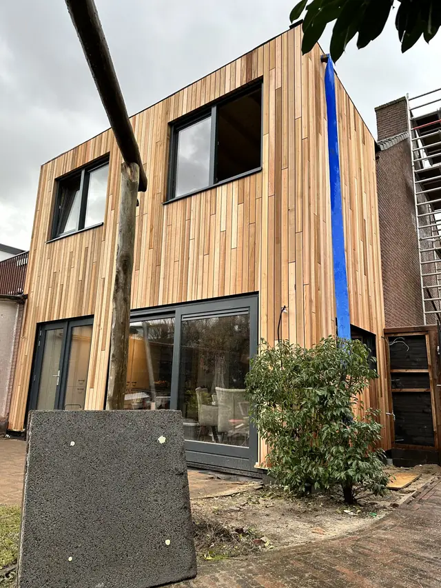 Dakopbouw met houten gevelbekleding, foto 7 van 16