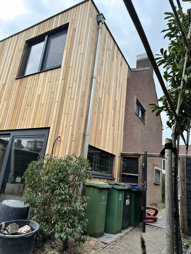 Dakopbouw met houten gevelbekleding, foto 14 van 16