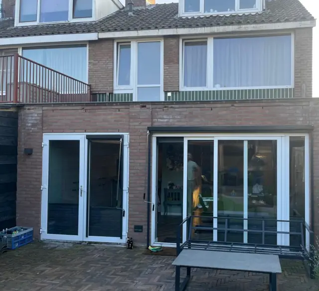 Dakopbouw met houten gevelbekleding, foto 16 van 16
