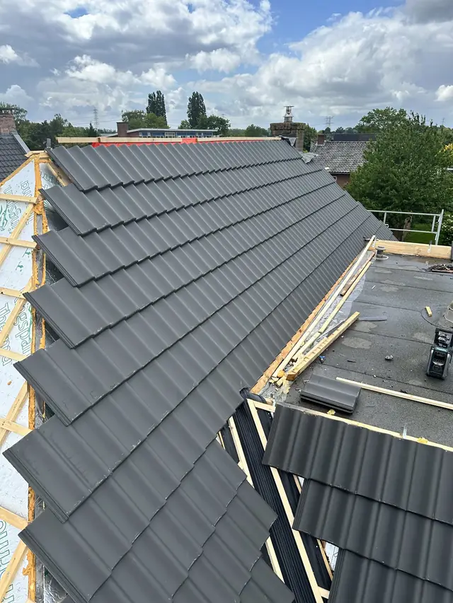 Dak vernieuwd met nieuwe pannen en dakraam, foto 13 van 27