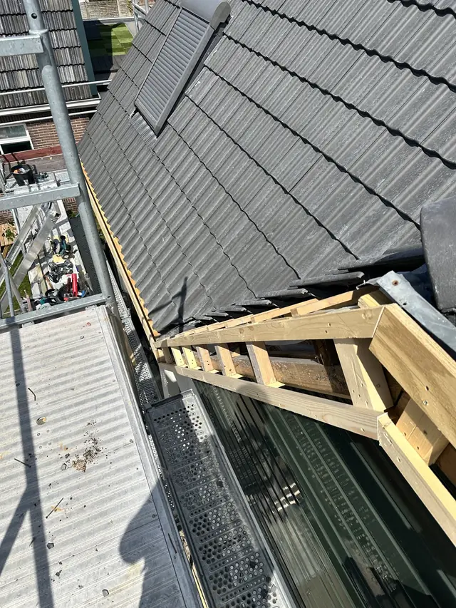 Dak vernieuwd met nieuwe pannen en dakraam, foto 20 van 27